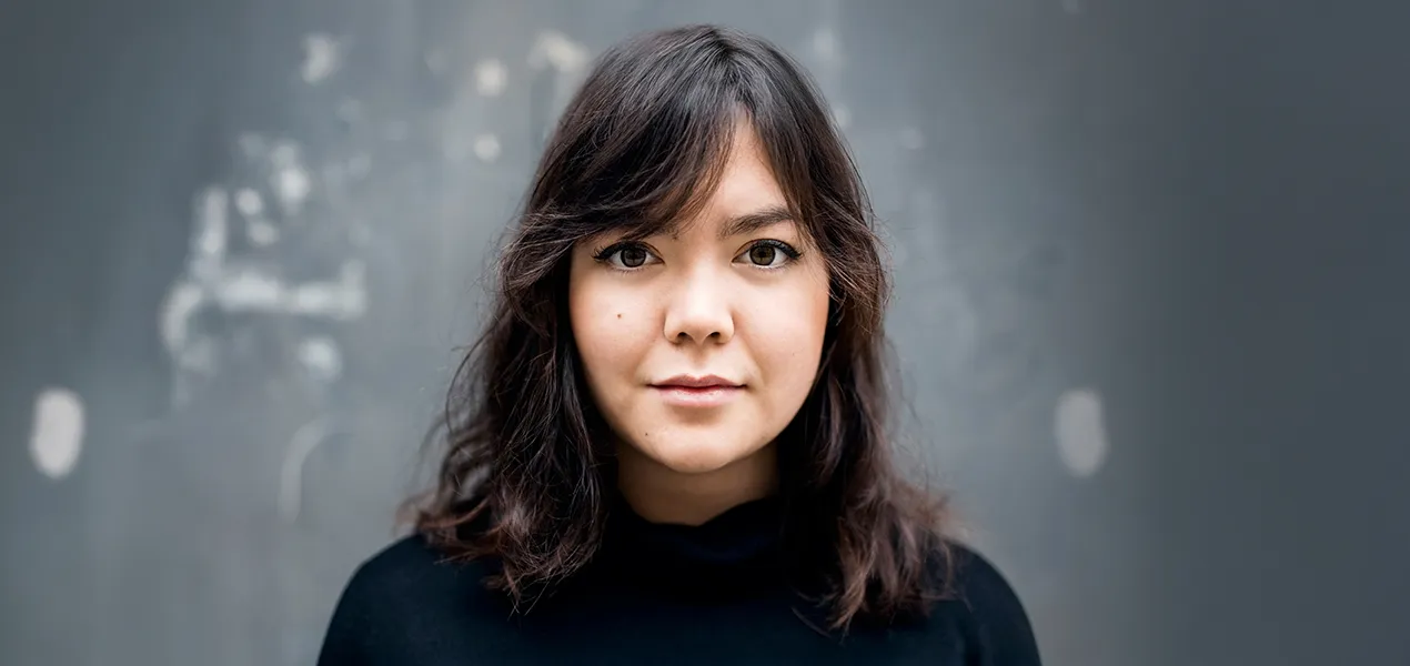 Young woman looking directly at the camera