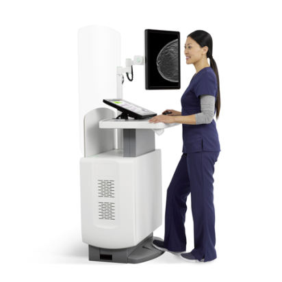 Technician working on medical machine on white background